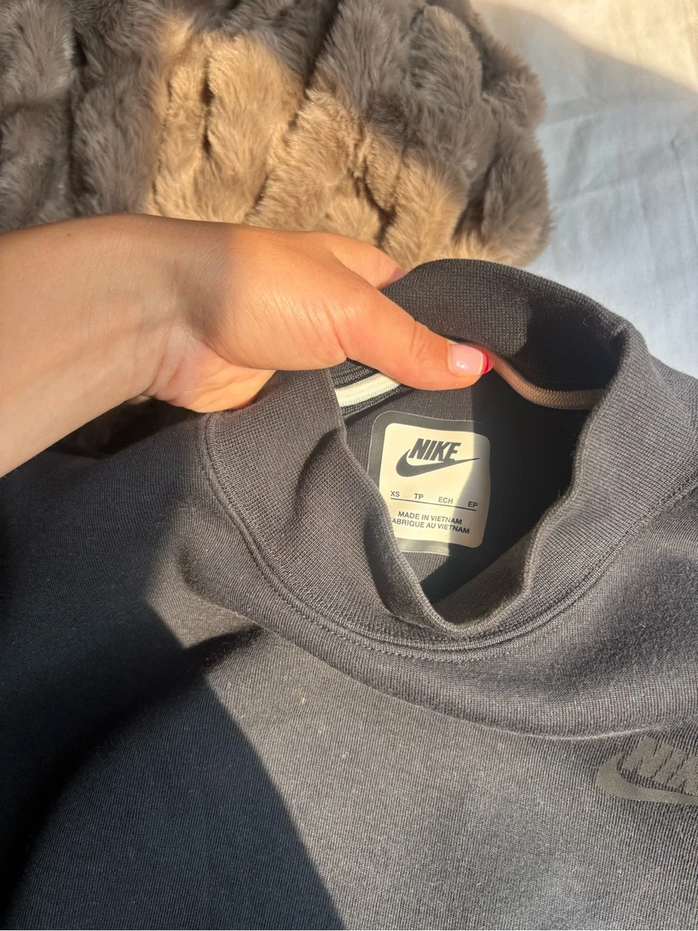 Women’s black Nike tech crewneck Sweater